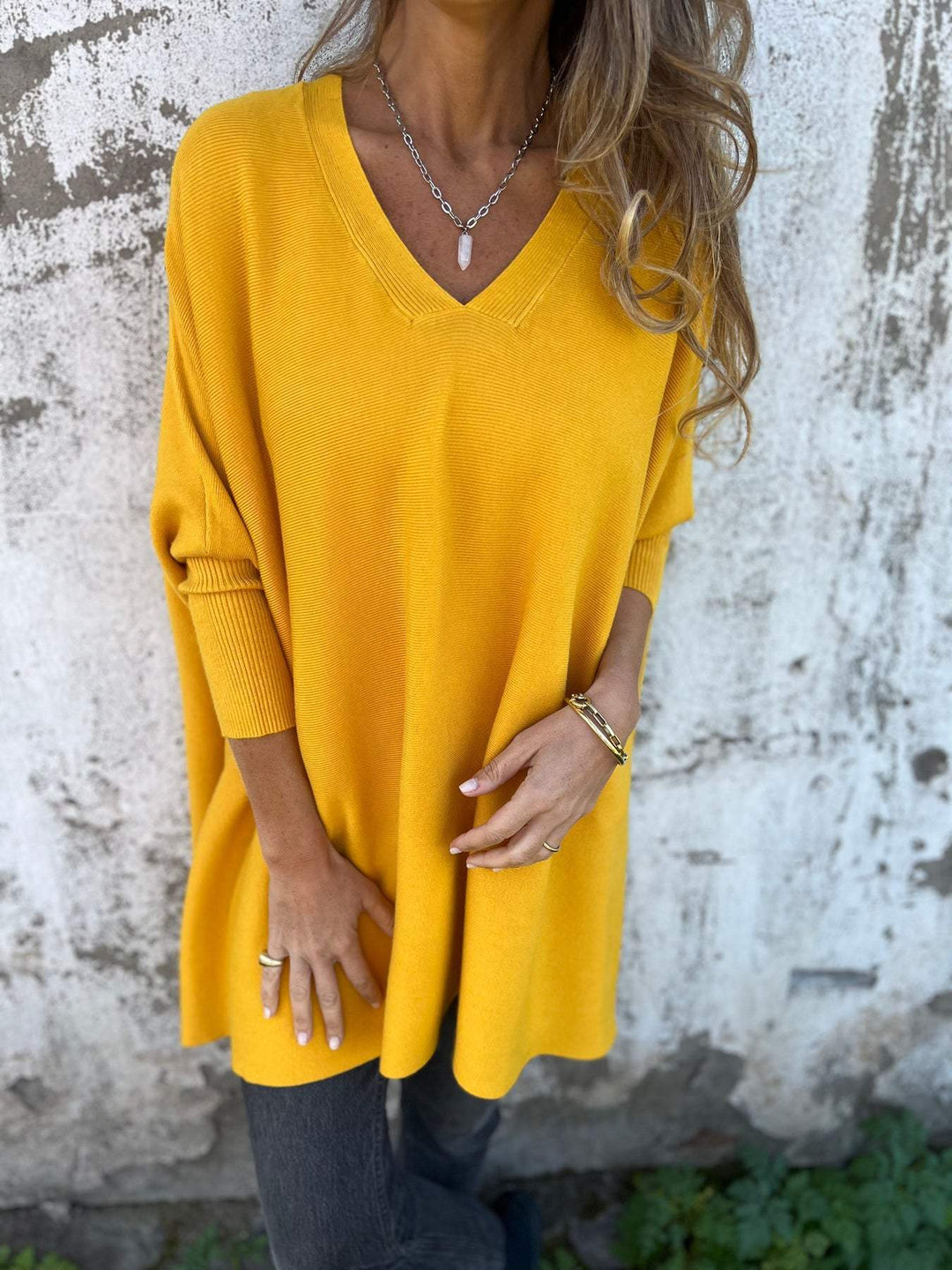 Koa™ elegant sweater by Emma & Rose Cape Town, featuring a cozy knit design in soft, neutral tones.