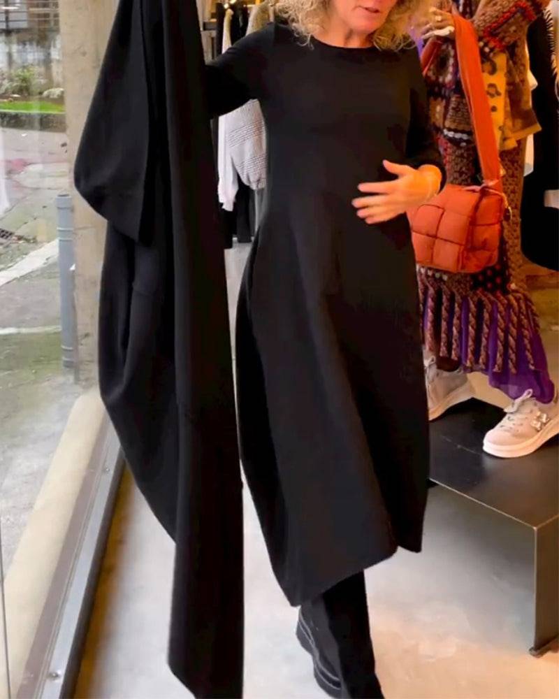 Black Clara™ midi dress by Emma & Rose Manhattan featuring pockets, stylish and comfortable for everyday wear.
