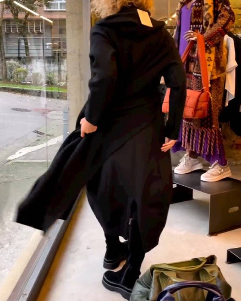 Black Clara™ midi dress by Emma & Rose Manhattan with practical pockets, featuring a sleek, fitted silhouette and elegant design.