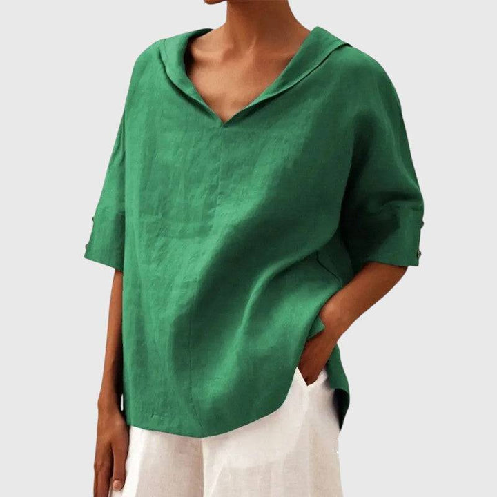 Ayla™ brown blouse by Emma & Rose Cape Town, featuring a stylish, flowy design with long sleeves and a relaxed fit.