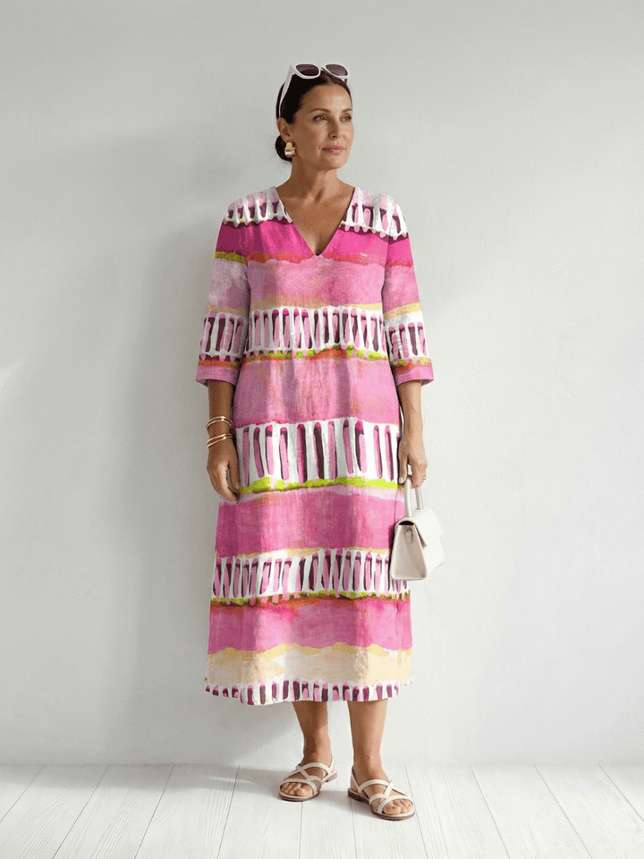 Calla™ Easy Flow patterned dress by Emma & Rose Cape Town, featuring a flowing design with vibrant, artistic patterns.