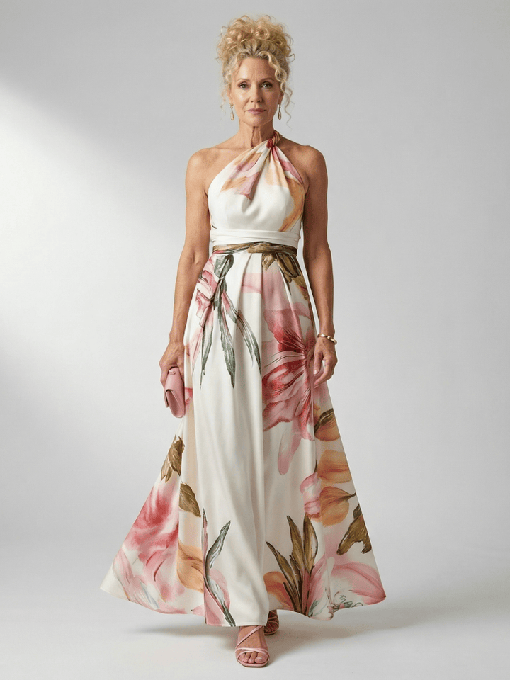 Light floral maxi dress by Emma & Rose Cape Town featuring a flowing silhouette and delicate floral print.