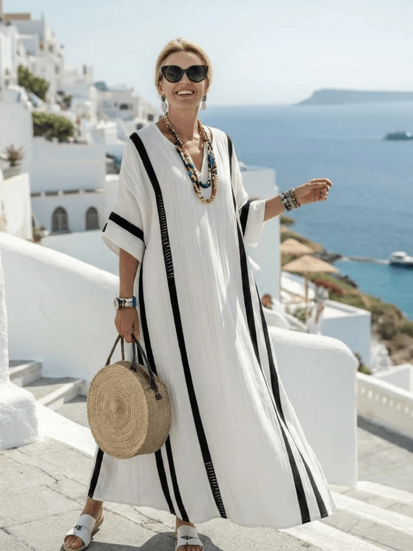 Elvienne™ block striped maxi dress by Emma & Rose Cape Town, featuring a flowing silhouette and bold horizontal stripe pattern.