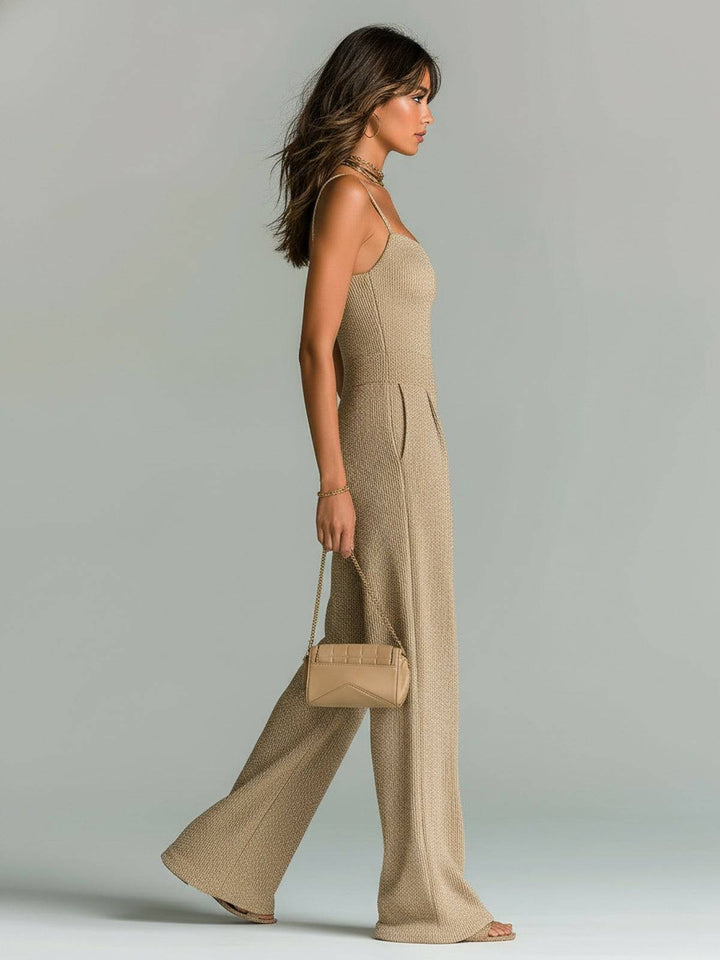 Emma & Rose Manhattan Isabella™ sleek jumpsuit shown in a stylish black design, featuring a fitted silhouette and elegant details.
