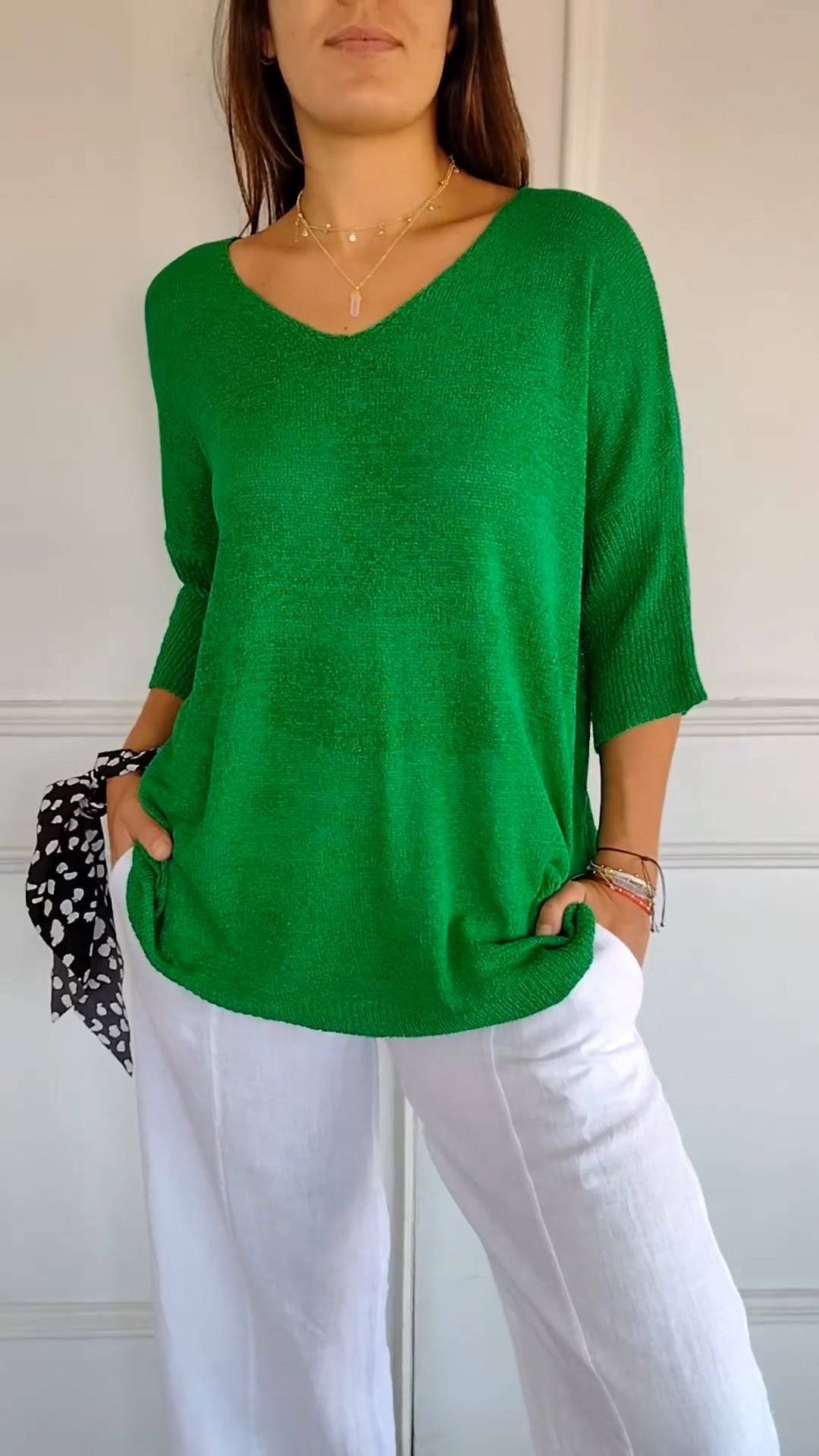 Emma & Rose Durban Jill™ timeless V-neck top in soft fabric, displayed on a hanger with a neutral background.