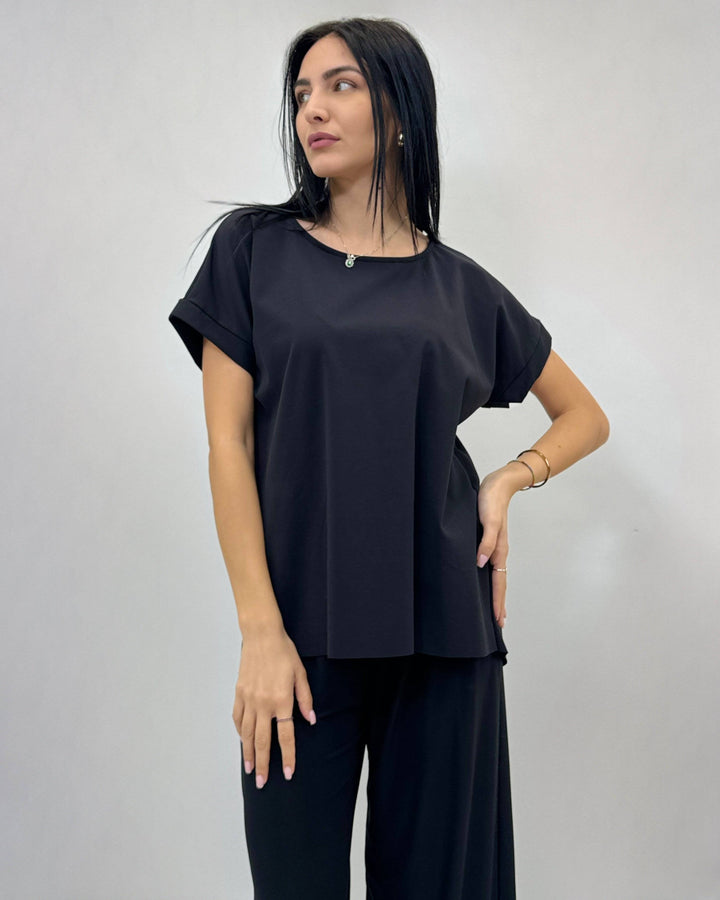 Emma & Rose Cape Town Petra™ short sleeve plain top in maglieria, showing a close-up of the soft, solid-colored knit fabric.