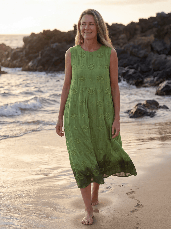 Kapua™ Garden Texture Midi Dress by Emma & Rose Cape Town, showing the dress with floral pattern and flowing fabric.