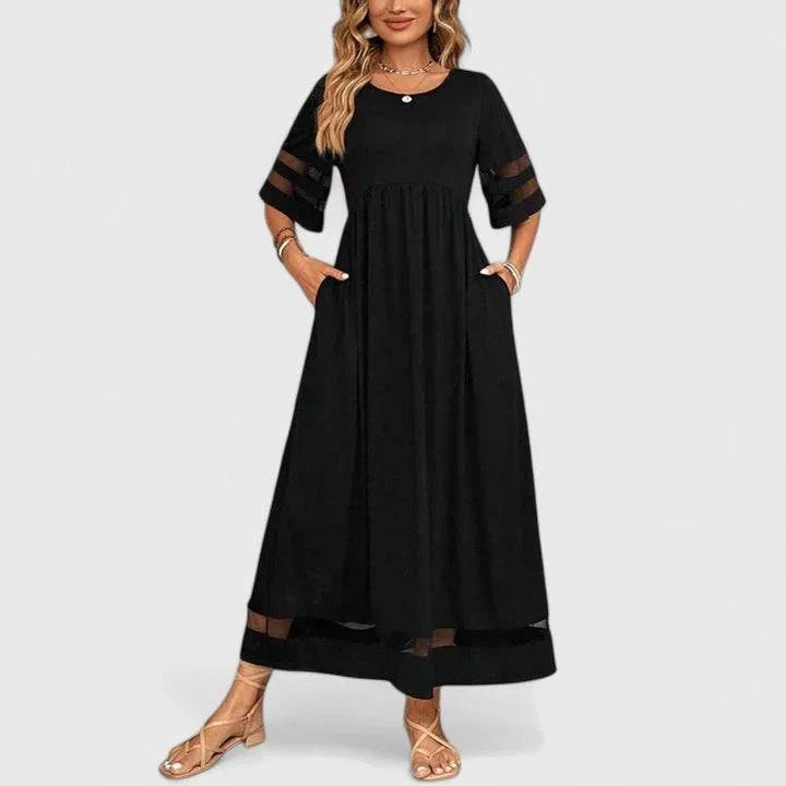 Elegant Delymarina™ midi dress by Emma & Rose Cape Town, featuring a flowing fabric and stylish design, shown on a hanger.
