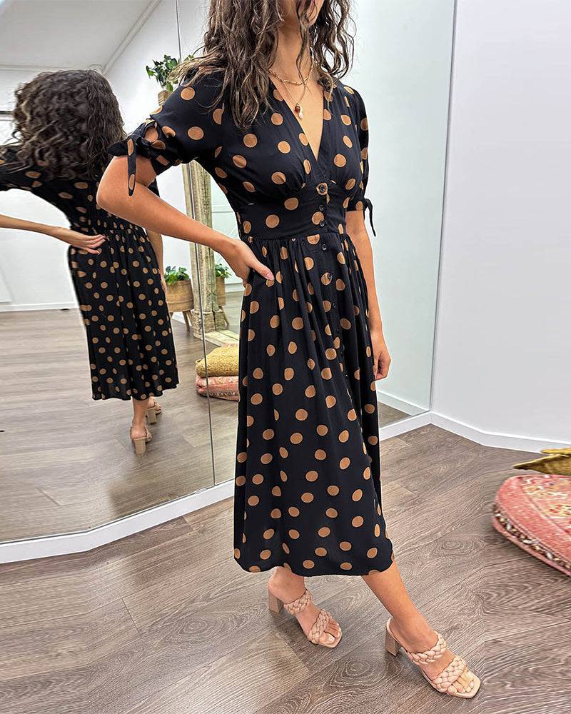 Emma & Rose Manhattan Monique™ polka dot dress with elegant design, featuring a stylish silhouette and classic black and white pattern.