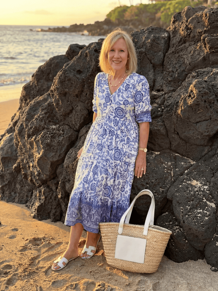 Nalani™ porcelain midi dress by Emma & Rose Cape Town, featuring a flowing fabric and elegant design, shown on a model.