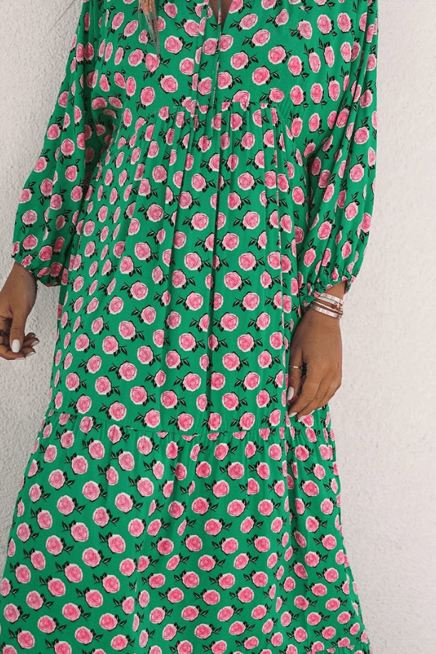 Emma & Rose Manhattan Vanessa™ long maxi dress with vibrant floral print, flowing fabric, and elegant design.