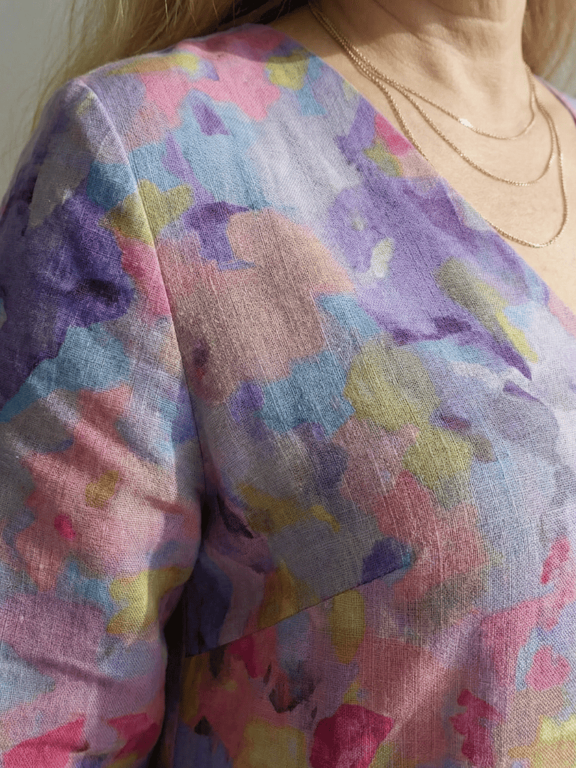 Emma & Rose Cape Town Benson™ abstract floral midi dress featuring a flowing silhouette and vibrant floral pattern.
