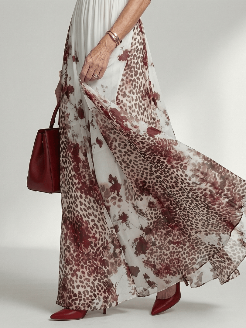 Emma & Rose Cape Town Orlune™ pleated white maxi dress with flowing fabric and elegant design, perfect for summer occasions.