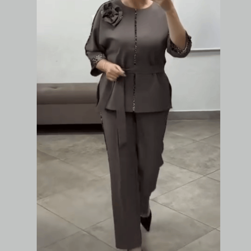 Elegant women's Zandri™ suit by Emma & Rose Durban featuring a tailored blazer and matching pants in classic style.