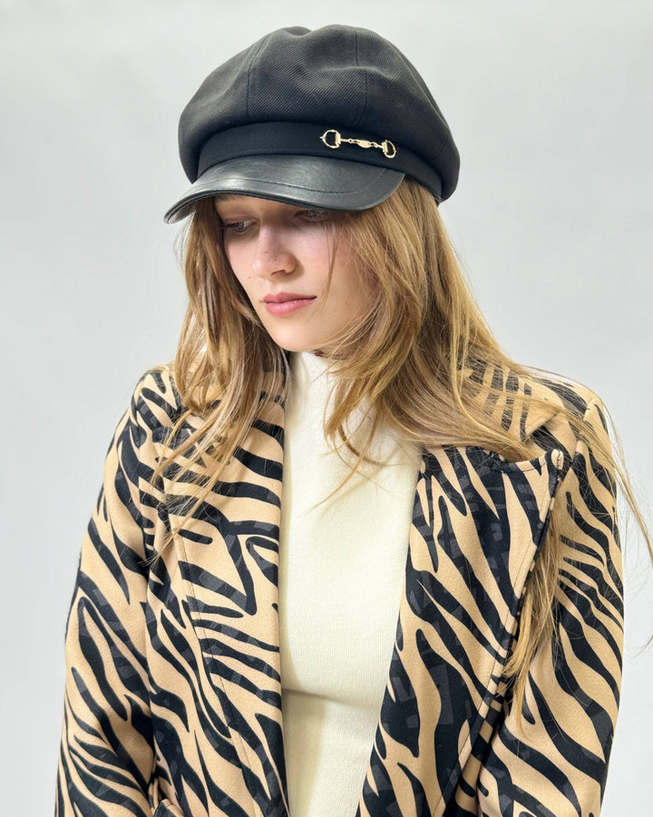 Emma & Rose Cape Town Delia™ cap visor with buckle detail, showcasing a stylish accessory with a curved brim and adjustable strap.
