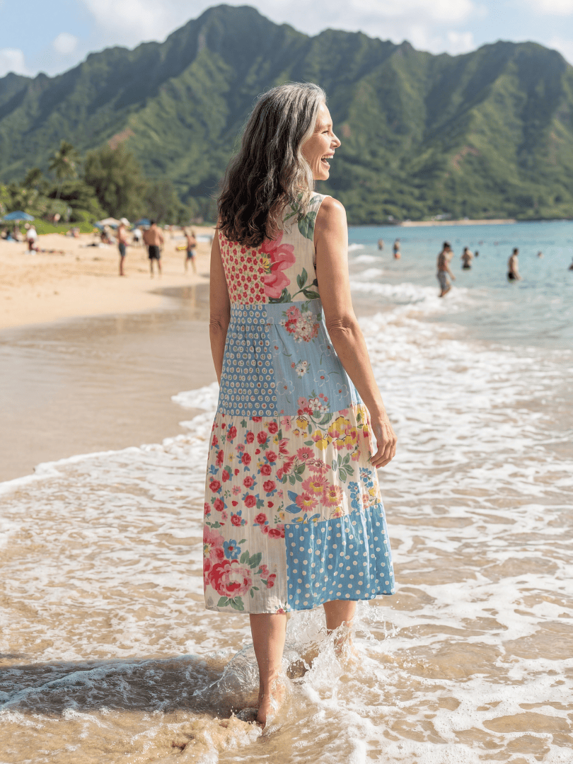Kira™ Coastal Floral Midi Dress by Emma & Rose Cape Town, featuring a flowy fabric with a vibrant floral pattern.