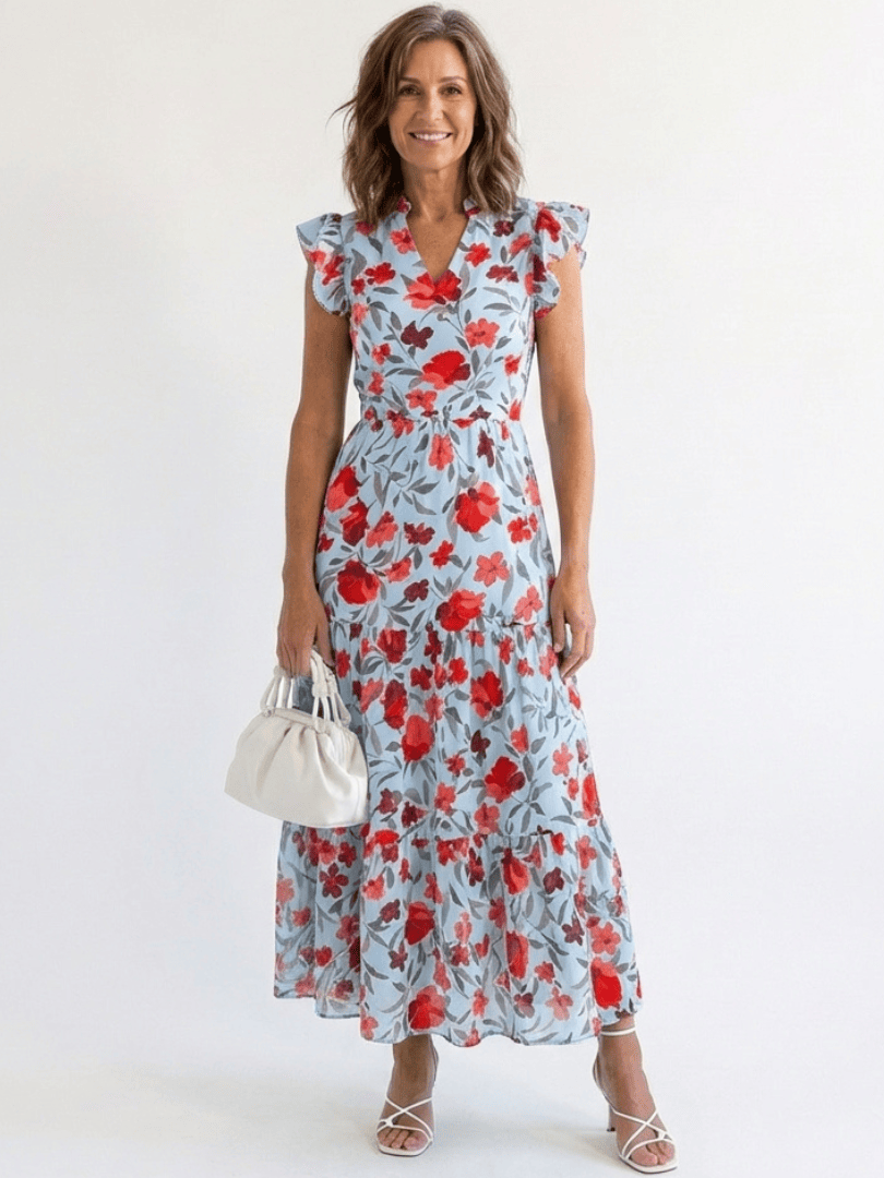 Lila™ V-neck tiered midi dress by Emma & Rose Cape Town, featuring flowing fabric and elegant layered design.