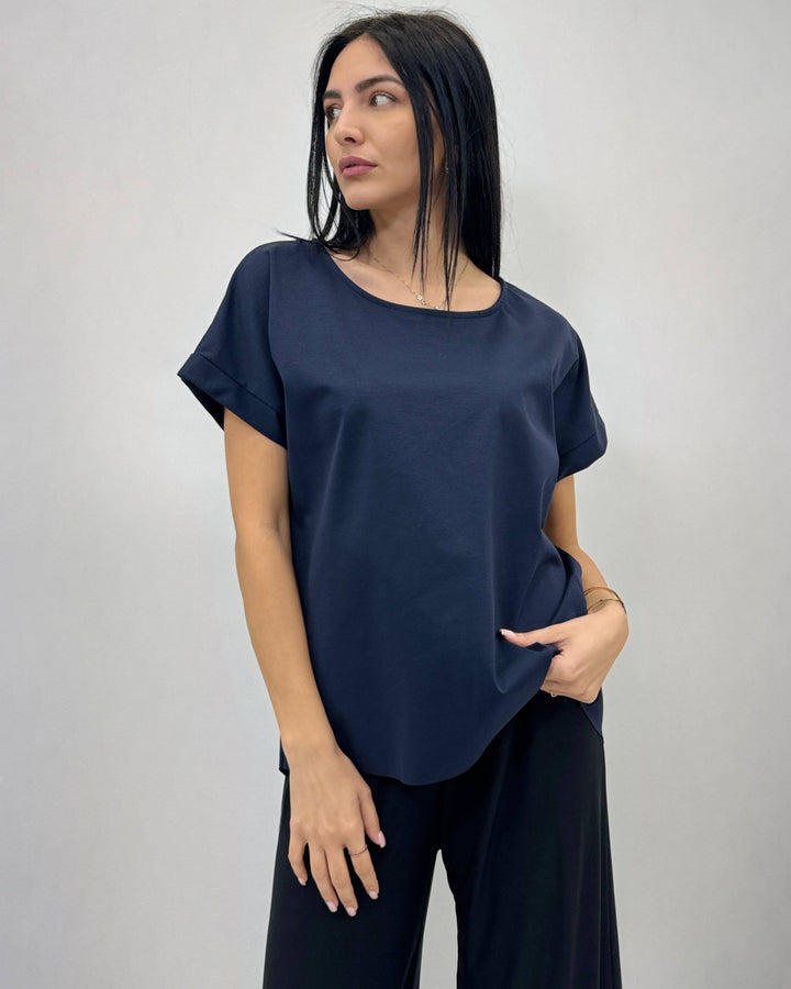 Emma & Rose Cape Town Petra™ short sleeve plain maglieria top in a neutral color, close-up of fabric and simple design.