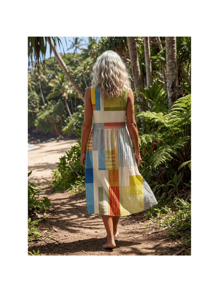 Esme™ Painted Block Midi Dress by Emma & Rose Cape Town, featuring a colorful, artistic pattern and flowing midi length.