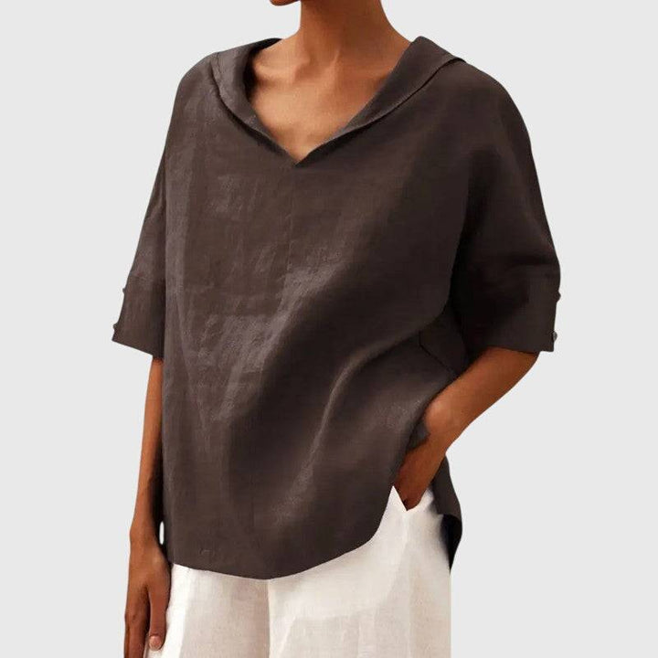 Ayla™ brown blouse by Emma & Rose Cape Town, featuring a stylish, flowy design with long sleeves and a relaxed fit.