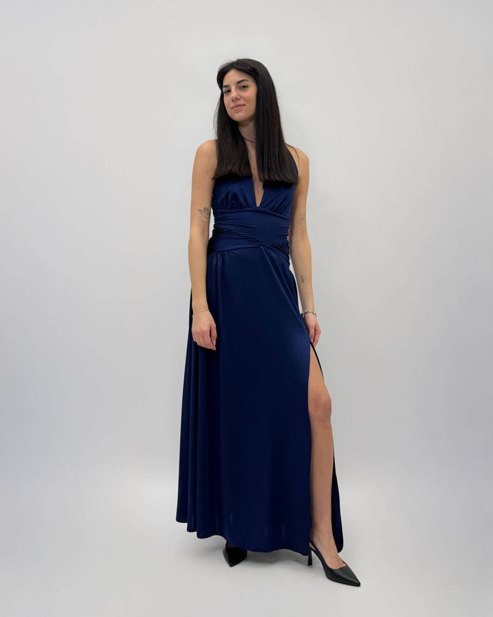 Michelle™ flowing dress by Emma & Rose Cape Town, featuring lightweight fabric and elegant design, shown hanging on a wooden hanger.