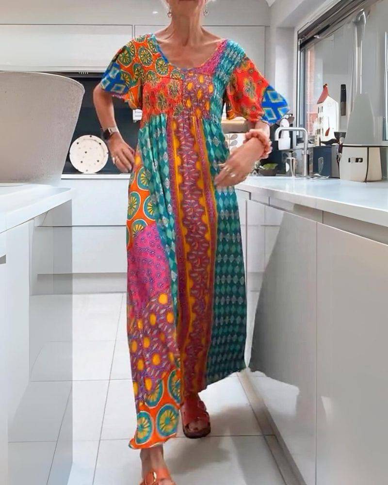 Corinne™ colorful bohemian dress by Emma & Rose Manhattan, flowing fabric with vibrant patterns and relaxed fit.