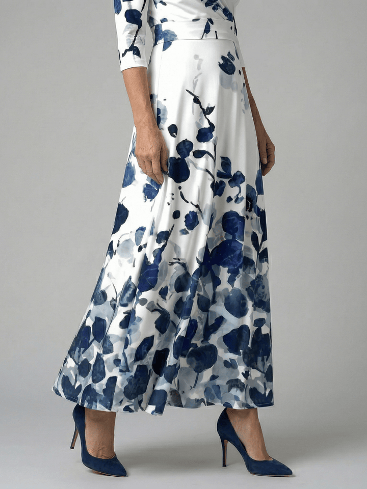 Celine™ wrap neck midi dress by Emma & Rose Cape Town, featuring a stylish wrap neckline and elegant midi length in soft fabric.