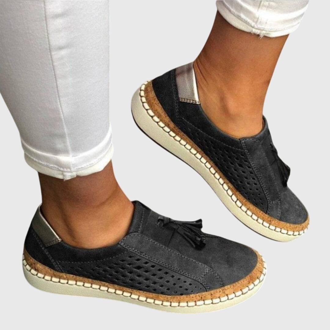 Emma & Rose Cape Town Piper™ orthopaedic slip-ons in black with cushioned insoles and slip-on design, showcasing comfort and support.