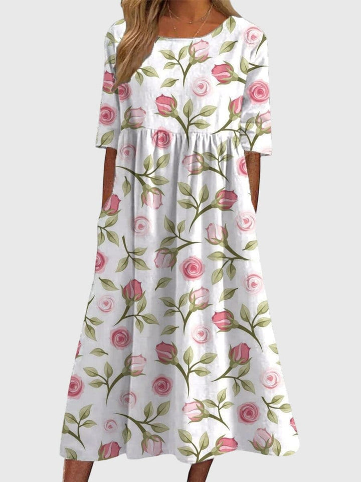Djala™ flattering women's dress by Emma & Rose Cape Town, stylish and elegant with a fitted silhouette and vibrant pattern.