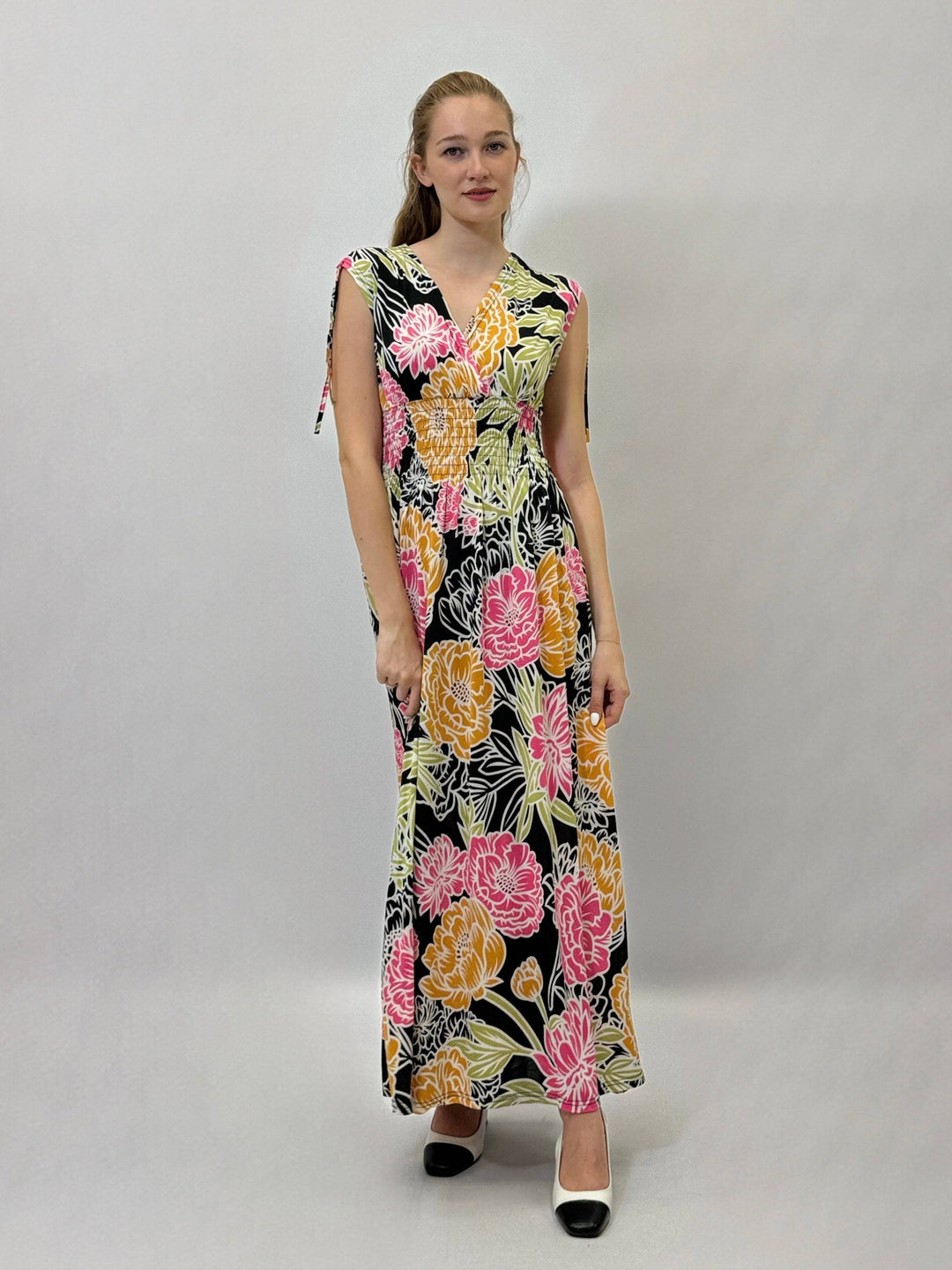 Ulrike™ floral print V-neck dress by Emma & Rose Cape Town, showcasing lightweight fabric and vibrant flower pattern.