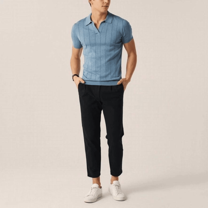 Emma & Rose Manhattan Portofino™ soft cotton polo shirt in pastel blue, featuring a classic collar and short sleeves.