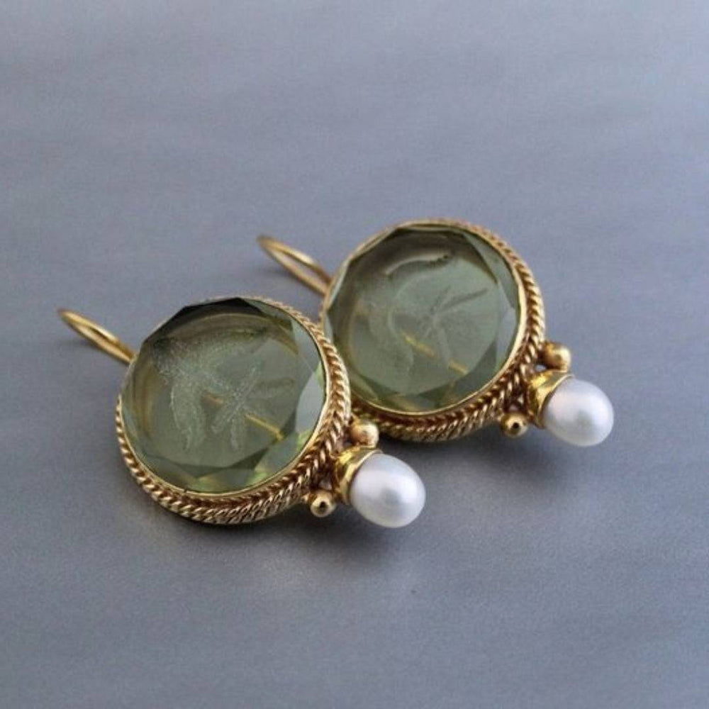 Elegant Navier™ earrings by Emma & Rose Cape Town featuring intricate design and silver finish, displayed against a neutral background.