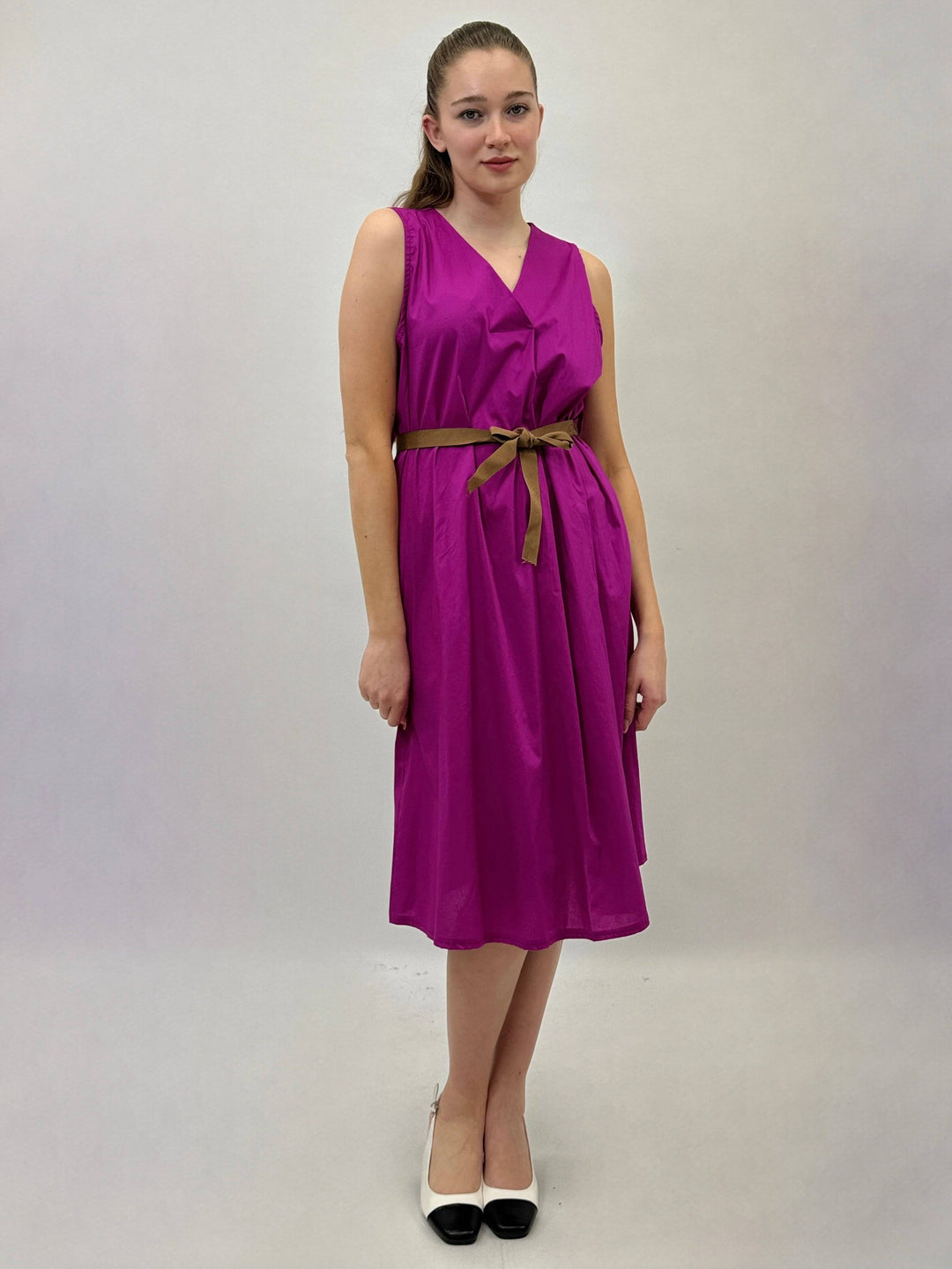 Xenia™ V-neck dress from Emma & Rose Cape Town featuring belt detail, stylish abiti with elegant neckline and fabric texture.