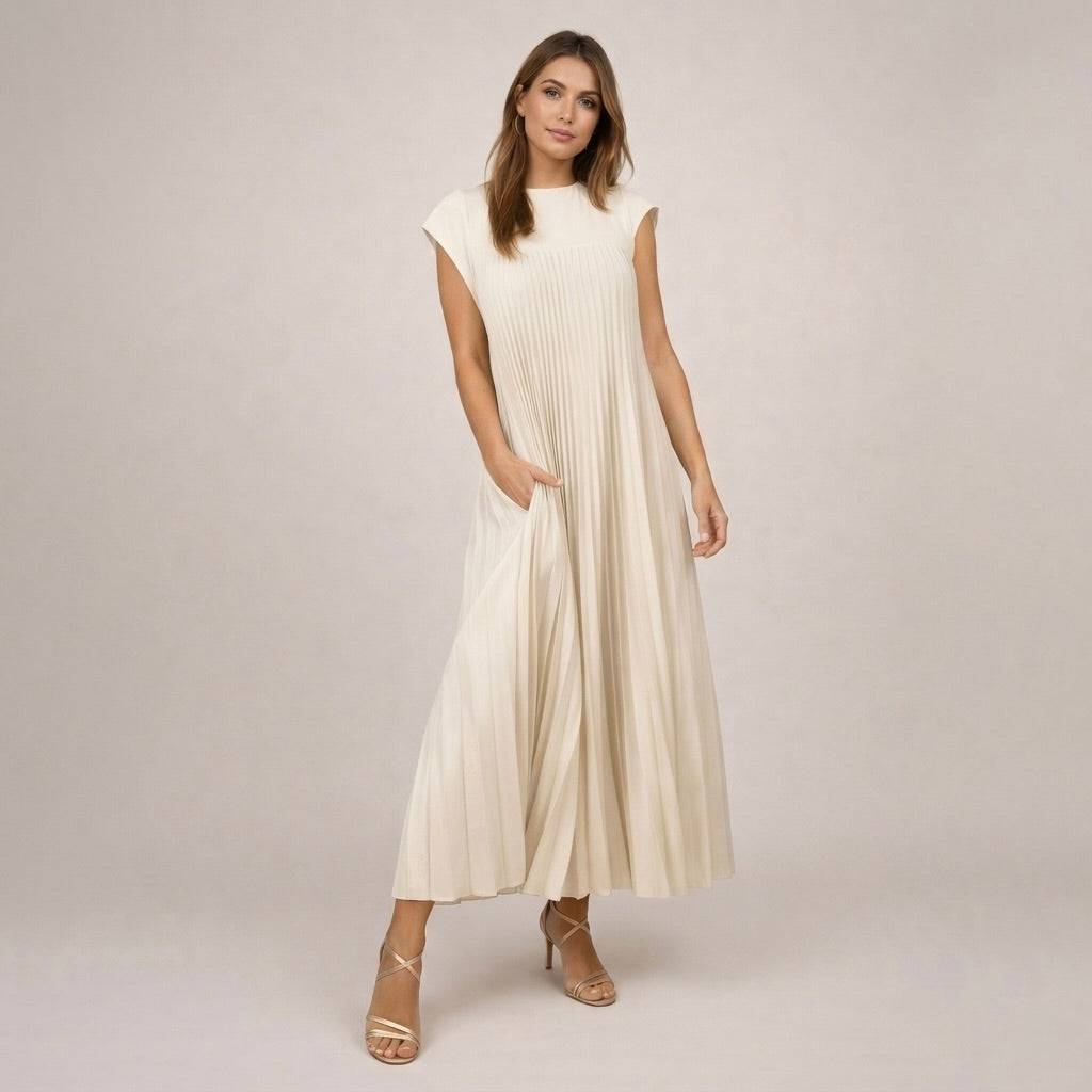 Emma & Rose Cape Town Marianne™ pleated midi dress featuring soft fabric and elegant pleats, ideal for stylish occasions.
