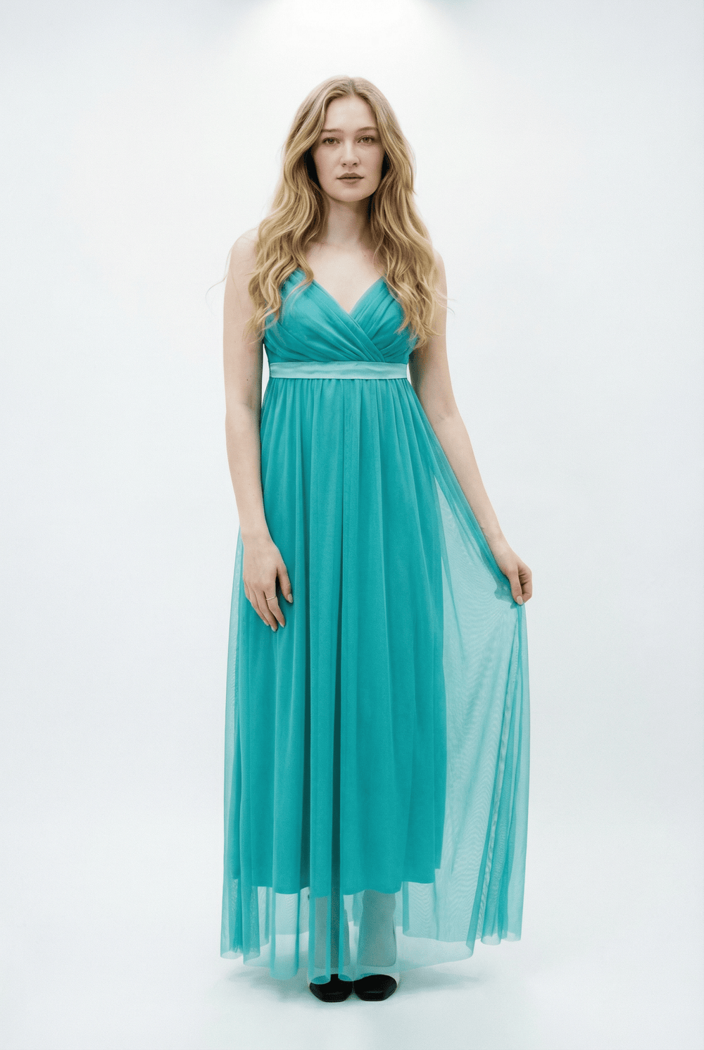 Elegant white Gisella™ flowing dress by Emma & Rose Cape Town, showcased on a professional photoshoot for special occasions.