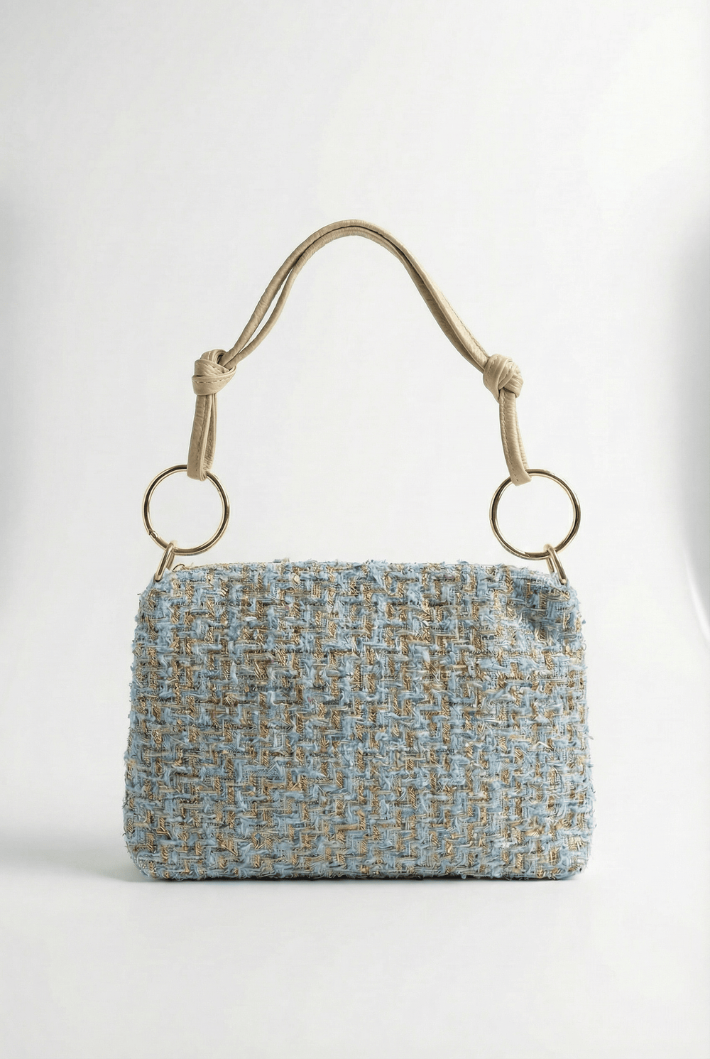 Jacoba™ Emma & Rose Cape Town bouclé fabric handbag with structured design and leather accents, shown in a close-up view.