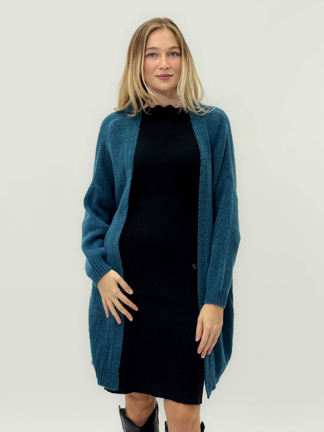 Warm-knit blend cardigan by Emma & Rose Cape Town, showing a cozy, textured knit design in earthy tones.