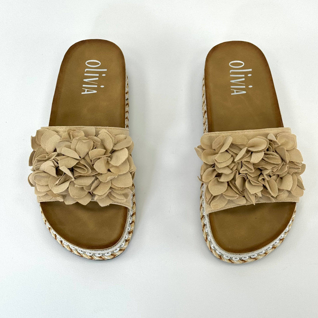 Emma & Rose Cape Town Platform™ slippers with ruffle details, featuring stylish slip-on design and soft fabric for casual comfort.