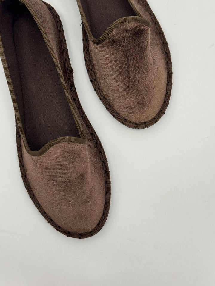 Amber™ Emma & Rose Cape Town soft luxurious fabric Friulane shoes, showing beige slip-on slippers with plush texture.