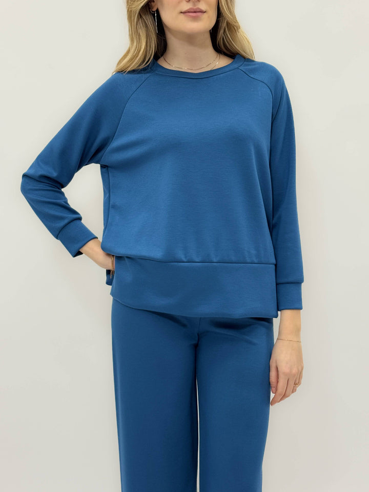 Emma & Rose Cape Town Orla™ complete outfit wide trousers with tailored fit, shown on a model in a stylish, casual setting.