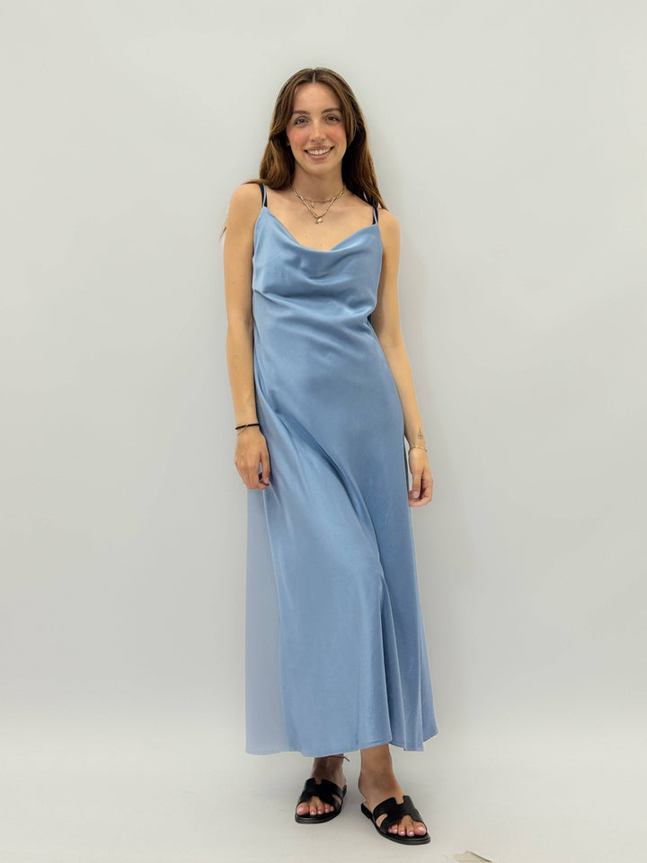 Flowing Alice™ dress by Emma & Rose Cape Town, lightweight abiti with elegant fabric and flowing silhouette, displayed on a hanger.
