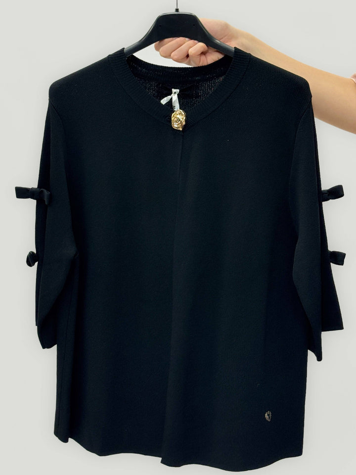 Lightweight™ Emma & Rose Cape Town cardigan with decorative bows, soft knit fabric, and a cozy, stylish fit.