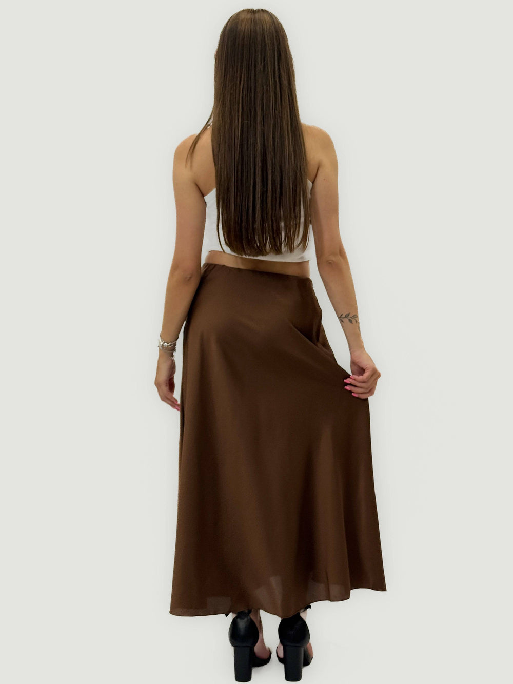 Emma & Rose Cape Town Margot™ long skirt with soft, luxurious fabrics and a high-waist design, shown in a flowing style.