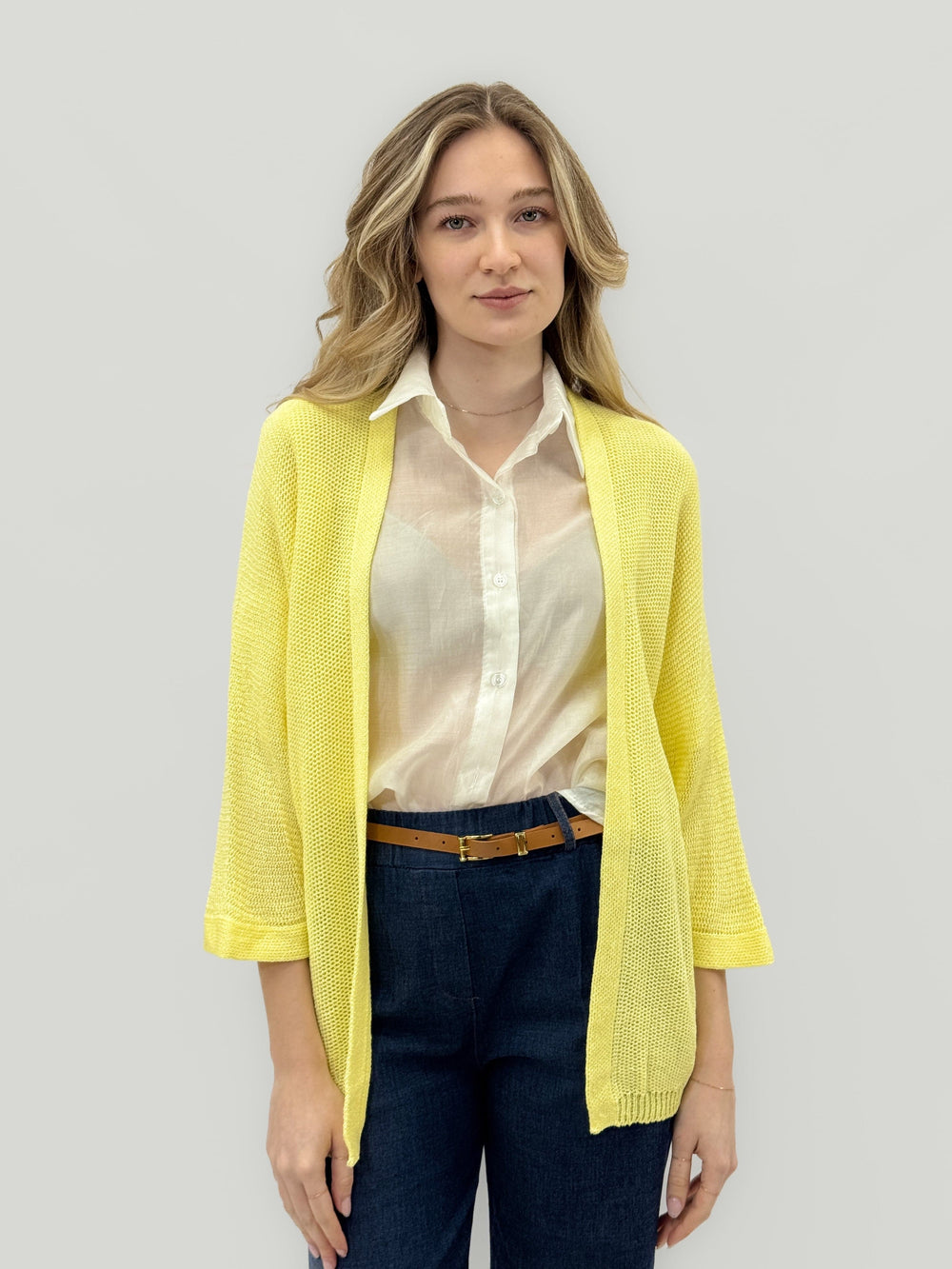 Willemien™ open-knit cardigan with 3/4 sleeves by Emma & Rose Cape Town, showing a lightweight, textured knit fabric.