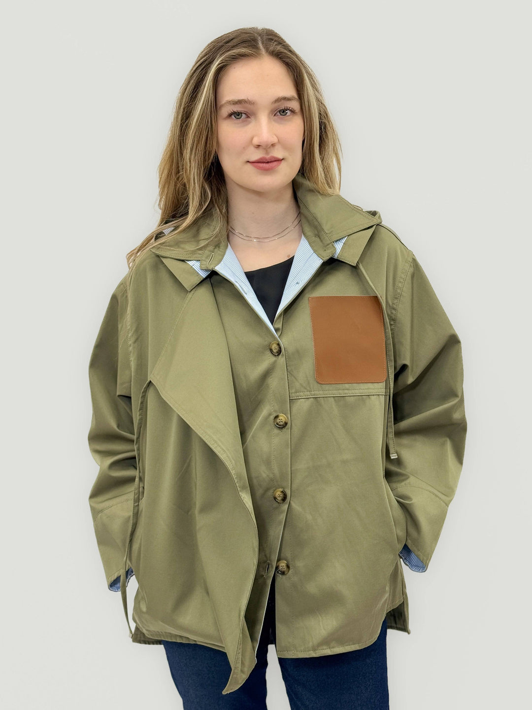 Francien™ asymmetrical jacket by Emma & Rose Cape Town featuring a contrasting hood and stylish design.
