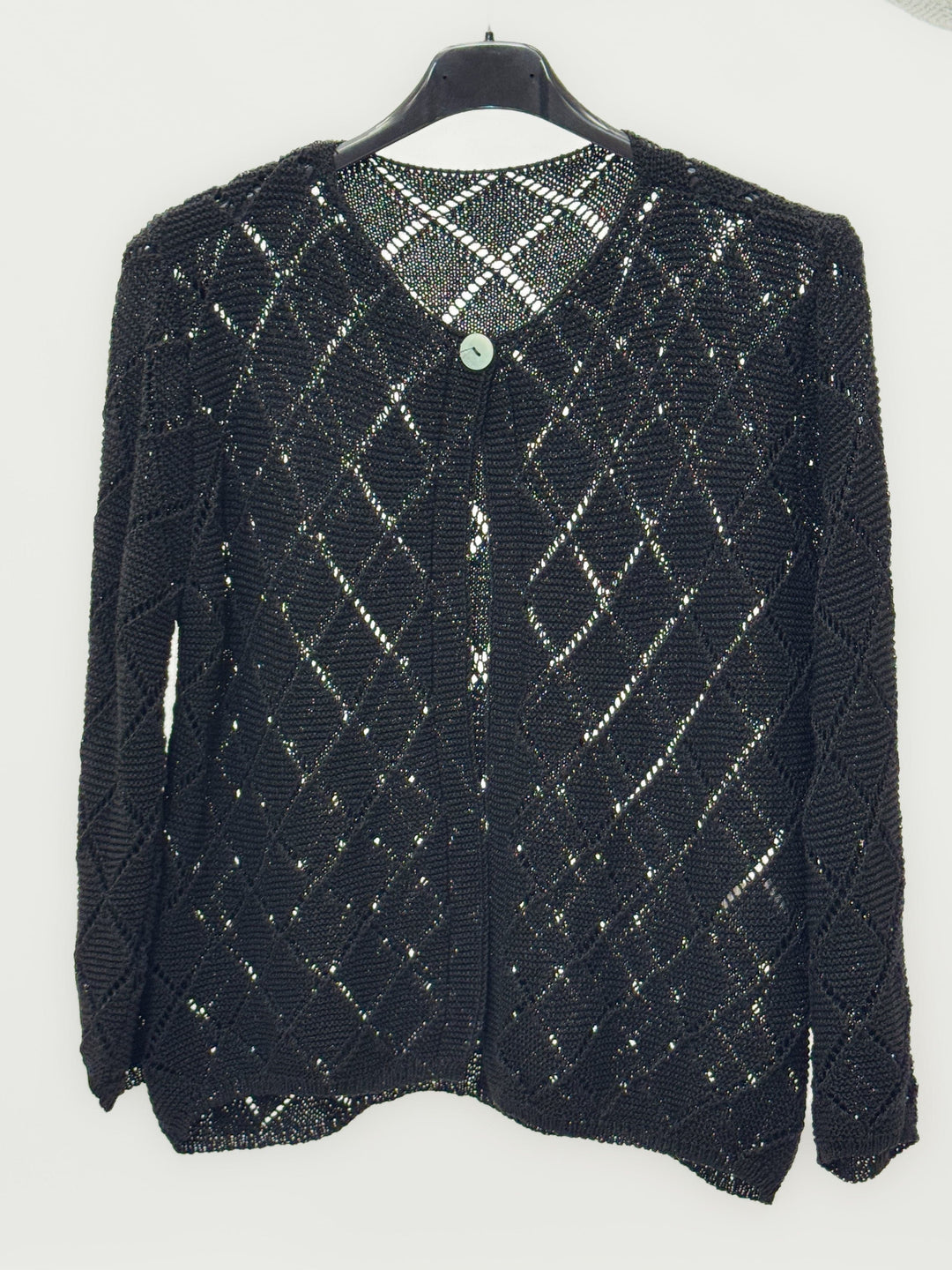 Emma & Rose Cape Town Ursula™ diamond knit cardigan with soft, luxurious fabrics and front closure, shown in natural lighting.