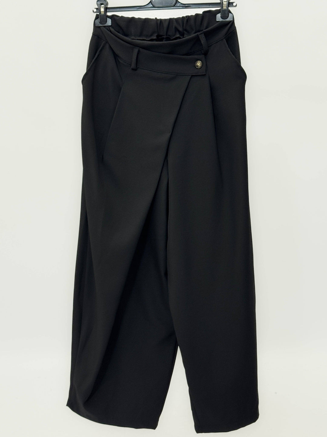 Kirsten™ high-waisted Palazzo trousers by Emma & Rose Cape Town, elegant black pantaloni with wide-leg design and flowy fabric.