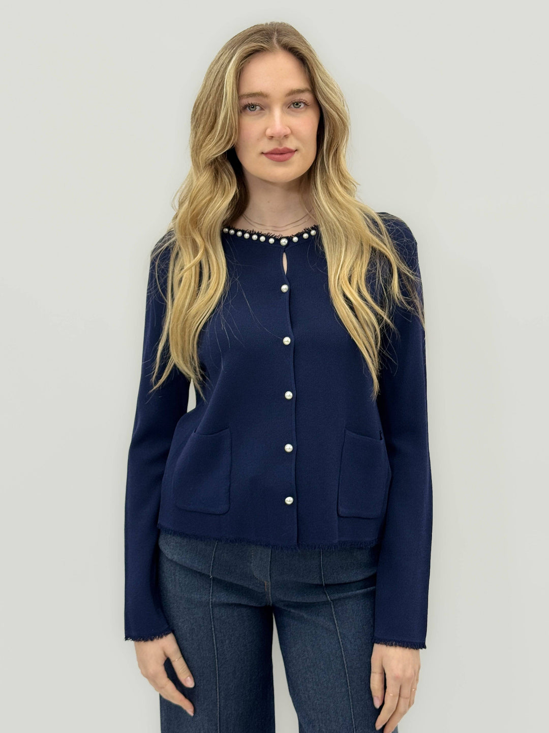 Emma & Rose Cape Town Talita™ cardigan with pearl button details, soft knit fabric, and elegant design on a neutral background.