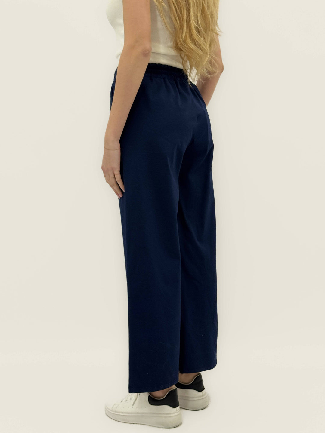 Women's Emma & Rose Cape Town tailored palazzo trousers in soft fabric, showing a relaxed fit and elegant design.