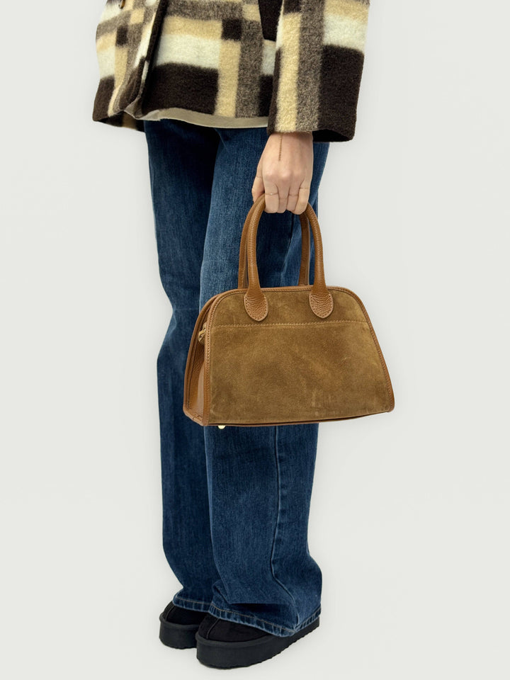 Emma & Rose Odette™ handbag with soft luxurious fabrics, stylish Italian design, featuring elegant craftsmanship and modern details.